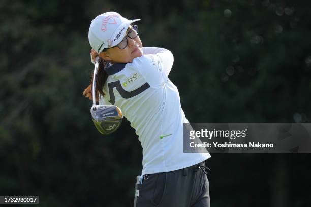 Sakura Yokomine of Japan hits her tee shot on the 9th hole during the first round of Udon-Ken Ladies Golf Tournament at Mannou Hills Country Club on...