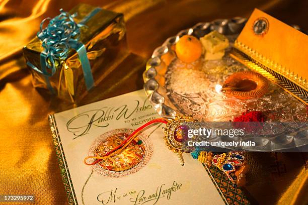 puja thali and greeting card at raksha bandhan - akhi stock pictures, royalty-free photos & images