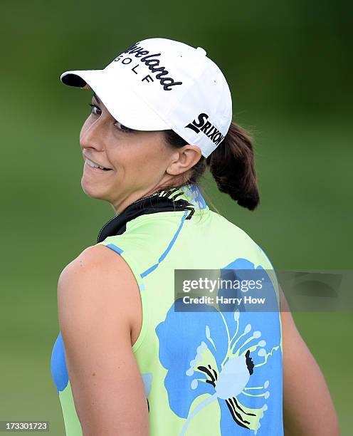 Paige Mackenzie jokes on the third green during round one of the Manulife Financial LPGA Classic at the Grey Silo Golf Course on July 11, 2013 in...