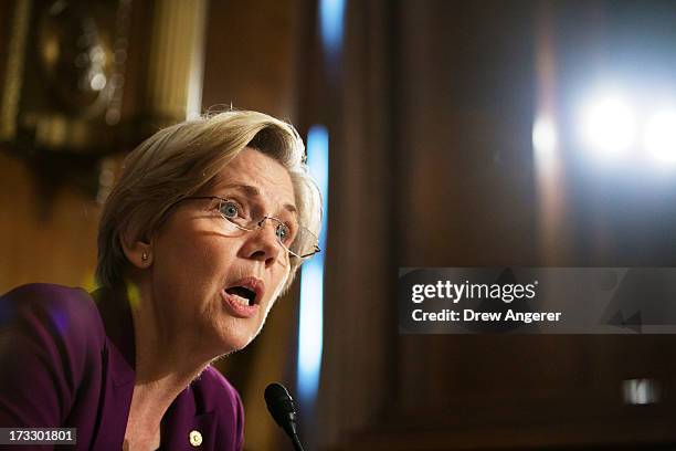 Sen. Elizabeth Warren questions witnesses during a Senate Banking, Housing and Urban Affairs Committee hearing on "Mitigating Systemic Risk Through...