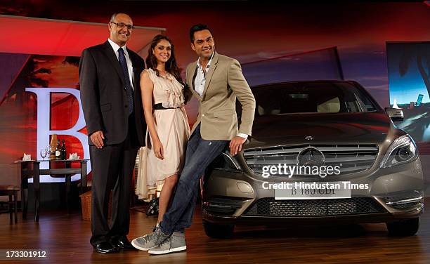 Mercedes-Benz India MD & CEO Eberhard Kerm with Bollywood actors Aditi Rao and Abhay Deol posing with the newly launched Mercedes-Benz New B-Class...