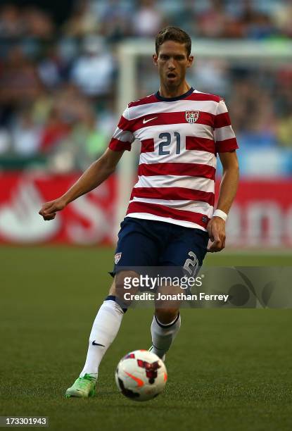 Clarence Goodson of the United States kicks the ball against Belize during the 2013 CONCACAF Gold Cup on July 9, 2013 at Jeld-Wen Field in Portland,...