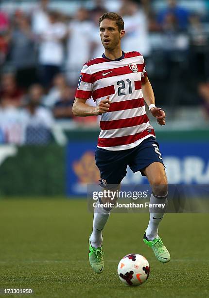 Clarence Goodson of the United States kicks the ball against Belize during the 2013 CONCACAF Gold Cup on July 9, 2013 at Jeld-Wen Field in Portland,...