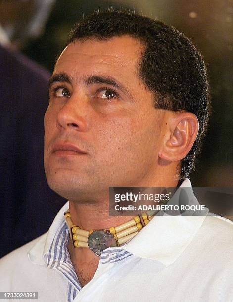 Juan Miguel Gonzalez, father of the boy Elian, wears an indian collar and participates in a ceremony for the safe return of his son 09 February, 2000...