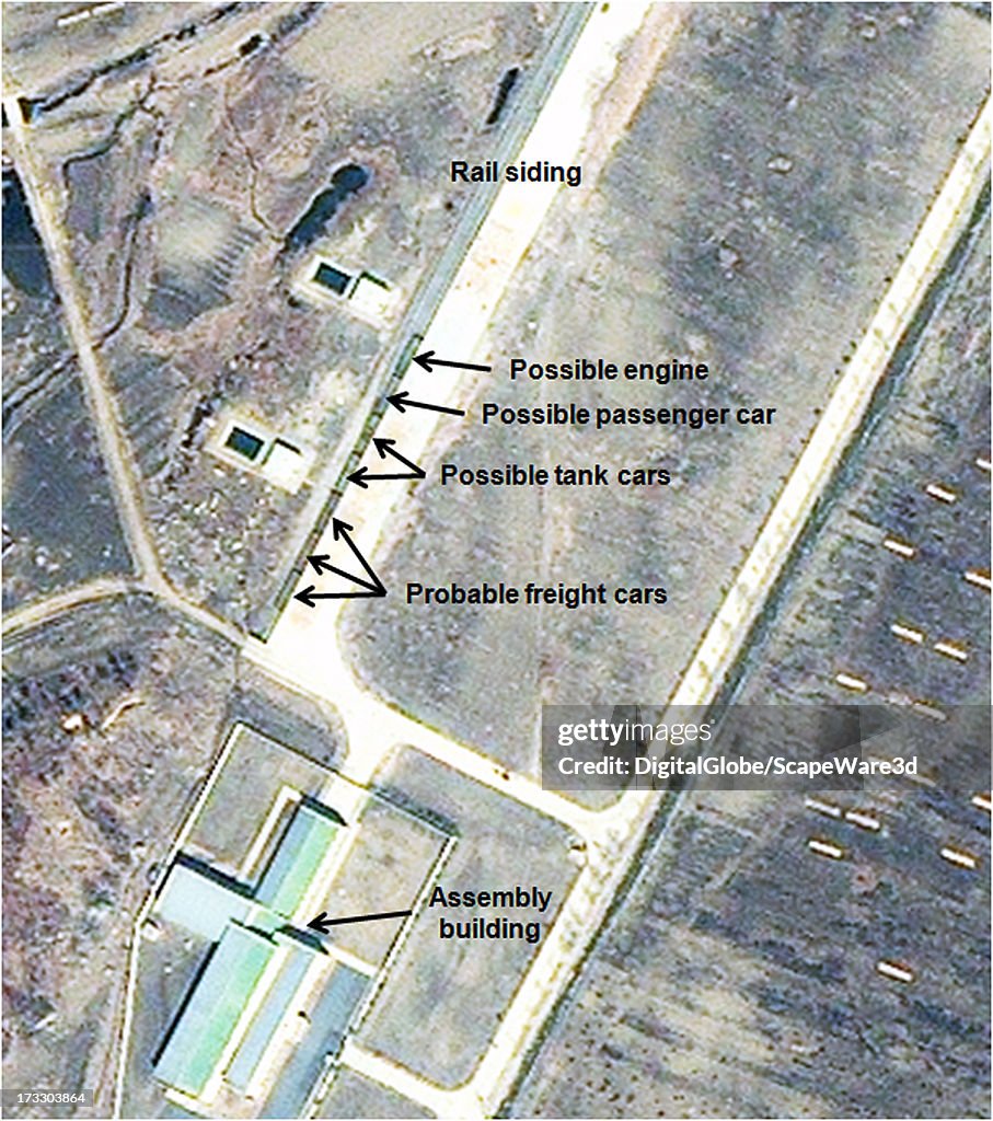 This is Figure 6.  Railcars parked at the train siding at Sohae. Satellite imagery taken March 29, 2013.  (Photo DigitalGlobe/38 North via Getty Images)