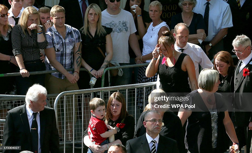 Zak Rigby Aimee West, fiancee of Fusilier Lee Rigby, , watches as wife Rebecca ...