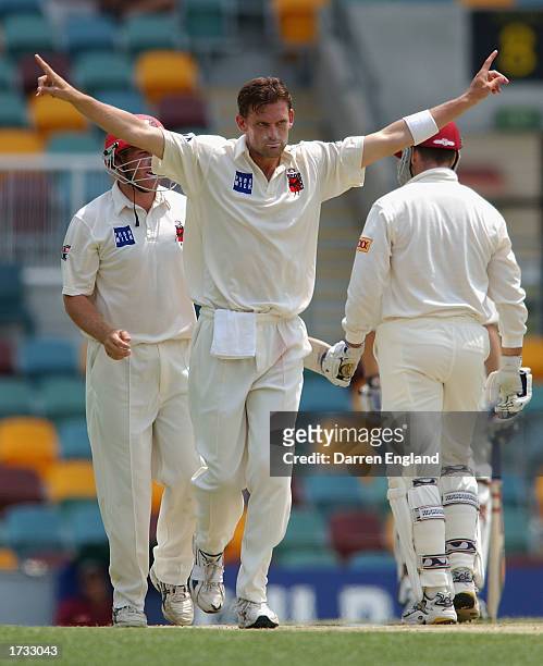 Mark Harrity of the Redbacks celebrates the wicket of Stuart Law of the Bulls during the Pura Cup match between the Queensland Bulls and Southern...