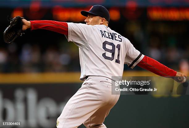 Relief pitcher Alfredo Aceves of the Boston Red Sox pitches against the Seattle Mariners at Safeco Field on July 9, 2013 in Seattle, Washington.