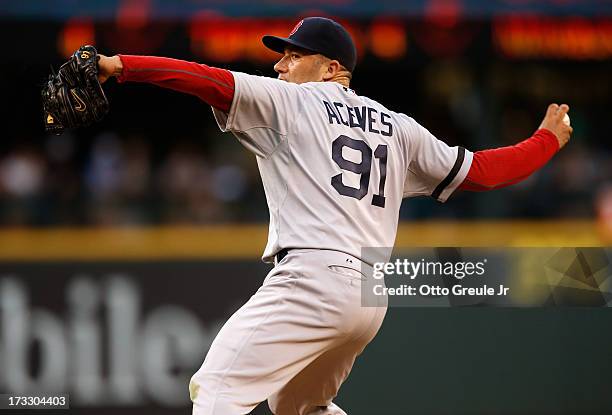 Relief pitcher Alfredo Aceves of the Boston Red Sox pitches against the Seattle Mariners at Safeco Field on July 9, 2013 in Seattle, Washington.