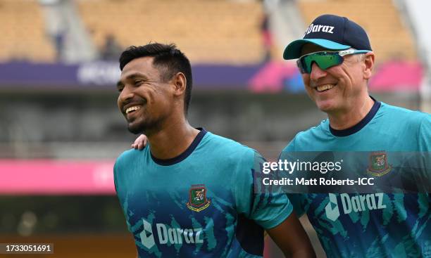 Mustafizur Rahman of Bangladesh interacts with Allan Donald, Bowling Coach of Bangladesh ahead of the ICC Men's Cricket World Cup India 2023 between...