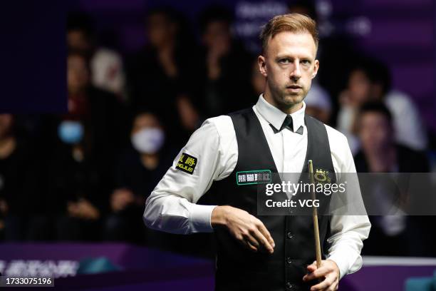 Judd Trump of England reacts in the Quarterfinal match against Tom Ford of England on day 5 of 2023 Wuhan Open at Wuhan Gymnasium on October 13, 2023...