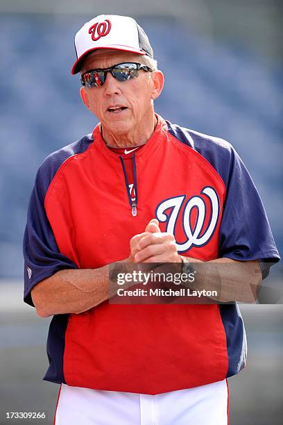 Manager Davey Johnson of the Washington Nationals looks on during batting practice of a baseball game against the Milwaukee Brewers on July 1, 2013...