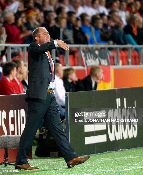 Dutch head coach Roger Reijners reacts during the UEFA Women's European Championship Euro 2013 group B football match Germany vs Netherlands on July...