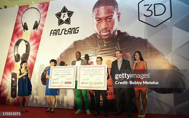 Dwyane Wade speaks on stage at his 3-D Headphones Launch Event presented by Fanstang at InTime Mall on July 11, 2013 in Hangzhou, China.