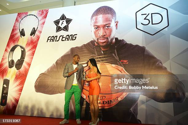 Dwyane Wade speaks on stage at his 3-D Headphones Launch Event presented by Fanstang at InTime Mall on July 11, 2013 in Hangzhou, China.