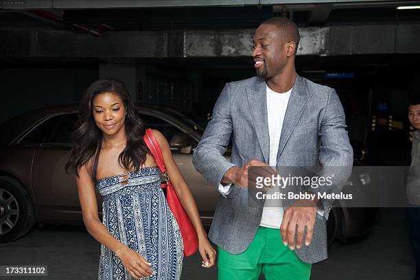 Gabrielle Union and Dwyane Wade visit Time Mall for Wade's 3-D Headphones Launch Event on July 11, 2013 in Hangzhou, China .