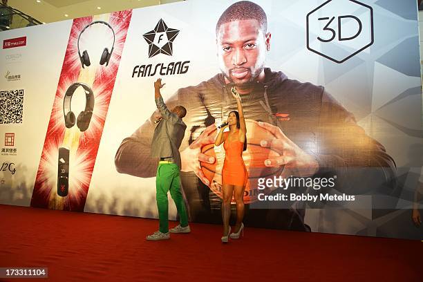 Dwyane Wade speaks on stage at his 3-D Headphones Launch Event presented by Fanstang at InTime Mall on July 11, 2013 in Hangzhou, China.