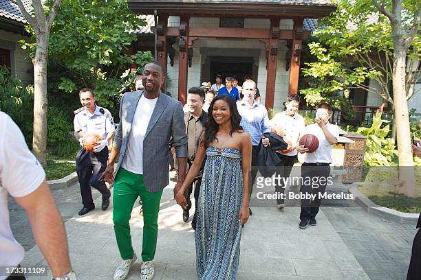 Dwyane Wade and Gabrielle Union leave Green City Villa after having lunch to head towards inTime Mall for Wade's 3-D Headphone Launch Event on July...