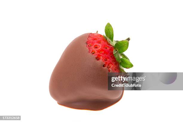 strawberry dipped in milk chocolate - chocolate dipped stock pictures, royalty-free photos & images