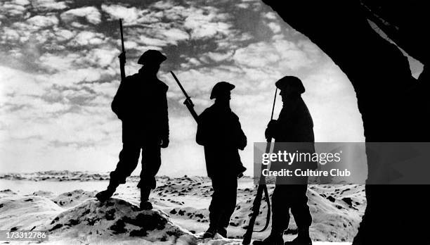 Sunset on the Western Front. Watchmen at their posts. Official British postcard issued by the Ministry of Information. War Office Photograph B. 1370.