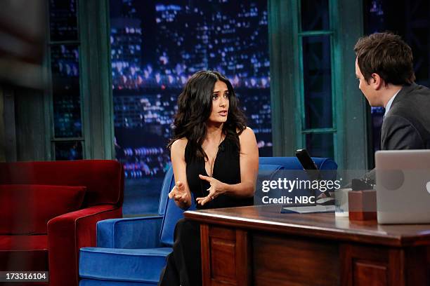 Episode 862 -- Pictured: Actress Salma Hayek Pinault with host Jimmy Fallon during an interview on the July 11, 2013 --