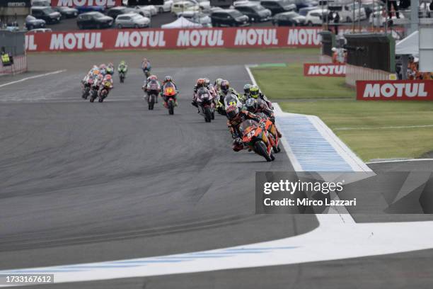 Deniz Oncu of Turkie and Red Bull KTM Ajo leads the field during the Moto3 race during the MotoGP of Japan - Race at Twin Ring Motegi on October 01,...