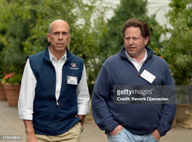 Jeffrey Katzenberg, film producer and CEO of DreamWorks Animation, and Bobby Kotick, CEO, president, of Activision, walk in Sun valley Village during...