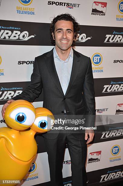 Indy Car Driver Dario Franchitti attends the Toronto Premiere Of "TURBO" on July 9, 2013 in Toronto, Canada.