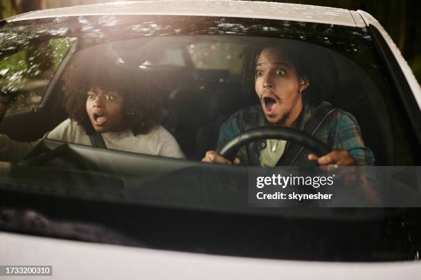 oh my god, we are going to crash! - woman surprised car stock pictures, royalty-free photos & images