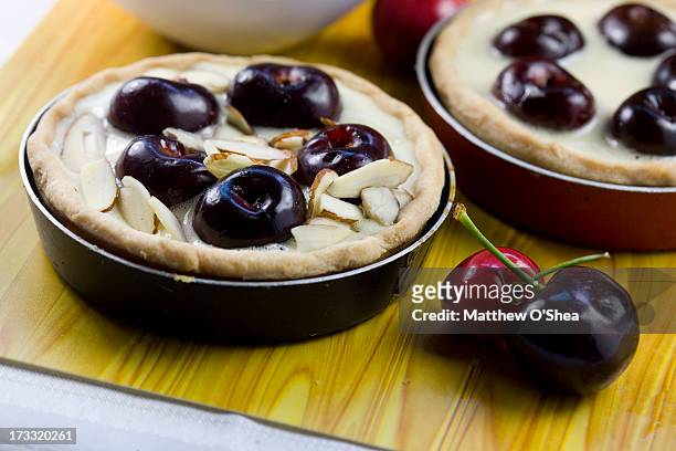 preparing to bake almond cherry pie - shea nut stockfoto's en -beelden