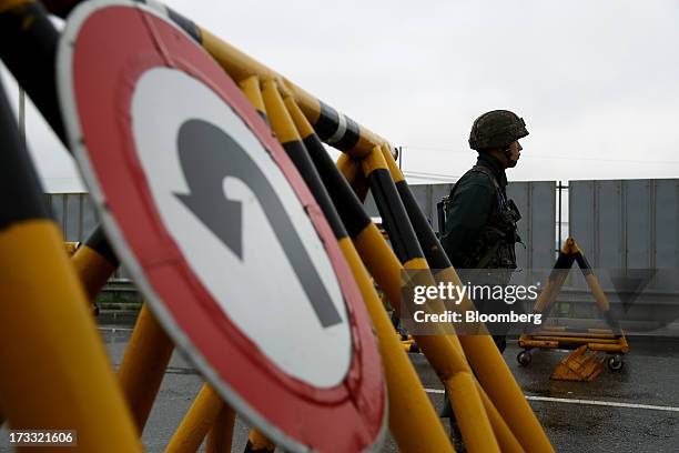 South Korean soldier stands guard at a military check point on the Unification Bridge, linked to North Korea, near the demilitarized zone in Paju,...