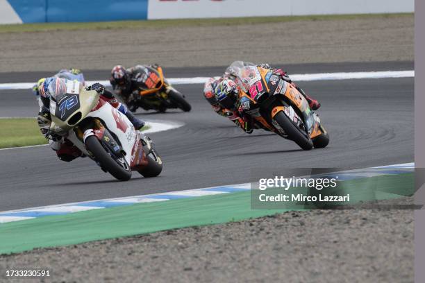 Ai Ogura of Japan and Idemitsu Honda Team Asia leads the field during the Moto2 race during the MotoGP of Japan - Race at Twin Ring Motegi on October...