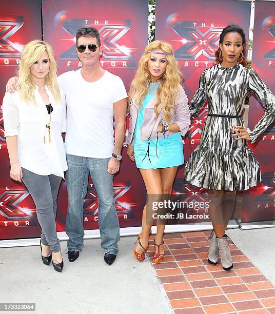 Demi Lovato, Simon Cowell, Paulina Rubio and Kelly Rowland attend Fox's 'The X Factor' Judges at Galen Center on July 11, 2013 in Los Angeles,...