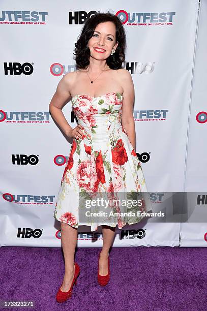 Actress Guinevere Turner arrives at the 2013 Outfest Opening Night Gala of C.O.G. At The Orpheum Theatre on July 11, 2013 in Los Angeles, California.