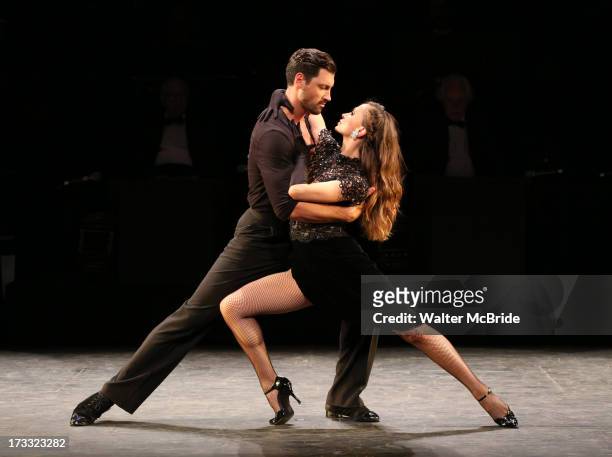 Dancers Maksim Chmerkovskiy and Karina Smirnoff performs "Forever Tango" Press Preview at Walter Kerr Theatre on July 11, 2013 in New York City.