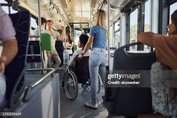 Cluttered Bus Rider 55 Bus Rider Wheelchair Stock Photos, High-Res Pictures, and Images ...