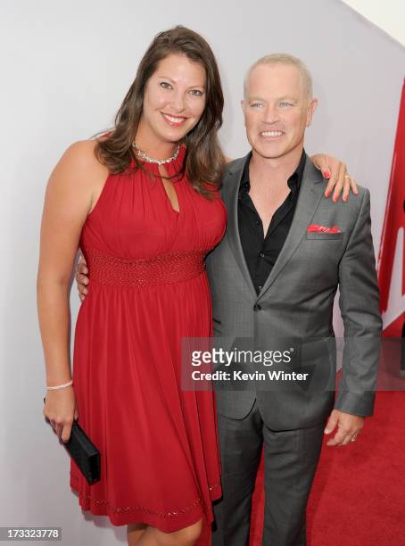 Actor Neal McDonough and Ruve McDonough attend the premiere of Summit Entertainment's "RED 2" at Westwood Village on July 11, 2013 in Los Angeles,...