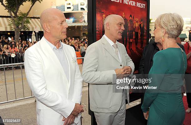 Actors Bruce Willis, John Malkovich and Helen Mirren attend the premiere of Summit Entertainment's "RED 2" at Westwood Village on July 11, 2013 in...