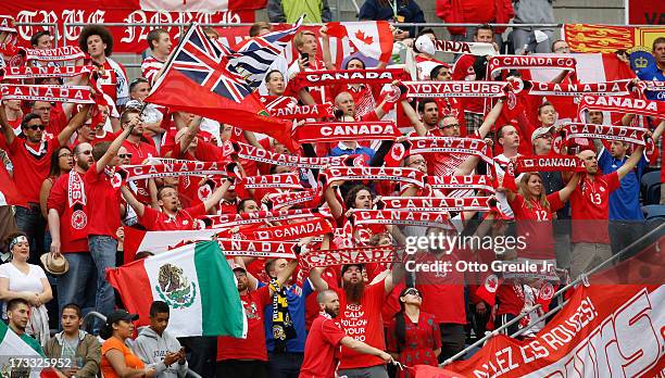 Fans of Canada cheer prior to the match against Mexico at CenturyLink Field on July 11, 2013 in Seattle, Washington. Mexico defeated Canada 2-0.