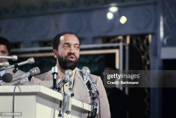 Wallace Muhammad , American Black Muslim leader, speaking at a press conference in Chicago, Illinois, March 1977.