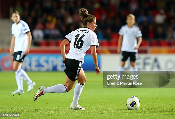 Melanie Leupolz of Germany runs with the ball during the UEFA Women's Euro 2013 group B match at Vaxjo Arena on July 11, 2013 in Vaxjo, Sweden.