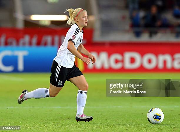Leonie Maier of Germany runs with the ball during the UEFA Women's Euro 2013 group B match at Vaxjo Arena on July 11, 2013 in Vaxjo, Sweden.