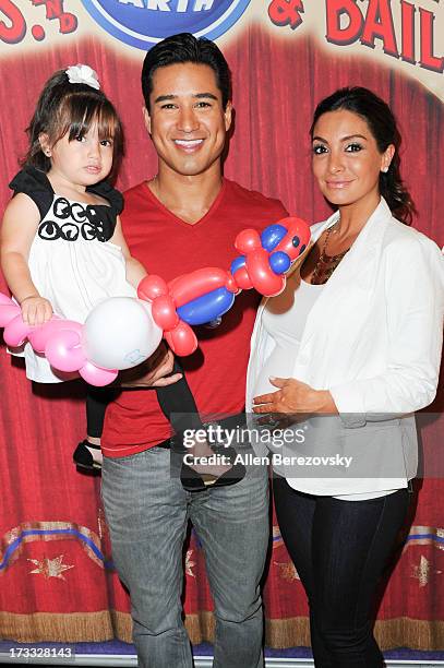 Mario Lopez, Courtney Mazza and daughter Gia Lopez attend the celebrity premiere of Ringling Bros. And Barnum & Bailey's "Built To Amaze!" tour at...