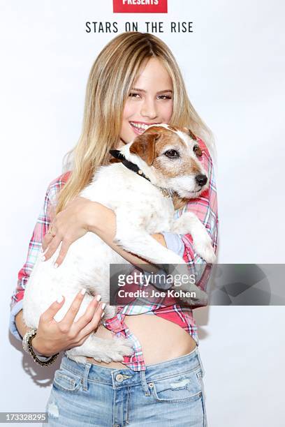 Actress Halston Sage and Uggie attend Abercrombie & Fitch Co. Presents their 2013 "Stars On The Rise!" at The Grove on July 11, 2013 in Los Angeles,...