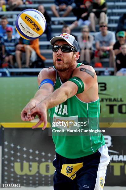 Brazil's Alison Cerutti controls the ball during the Alison-Emanuel v Bockermann-Urbatzka game as part of the FIVB Gstaad Grand Slam third day on...