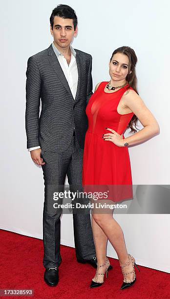 Musician Nick Simmons and sister TV personality Sophie Simmons attend the premiere of Summit Entertainment's "RED 2" at Westwood Village on July 11,...