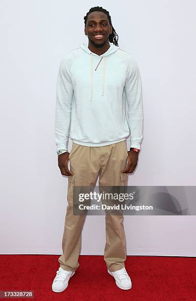 Player Kenneth Faried attends the premiere of Summit Entertainment's "RED 2" at Westwood Village on July 11, 2013 in Los Angeles, California.