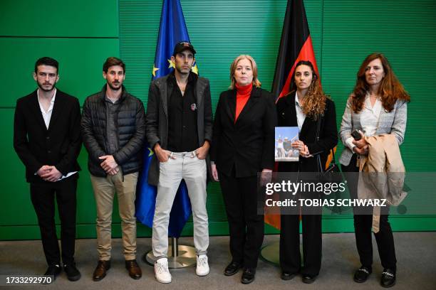 President of the Bundestag Baerbel Bas poses with Ricarda Louk , mother of missing Shani Nicole Louk, with Gili and Roni Roman , brother and sister...