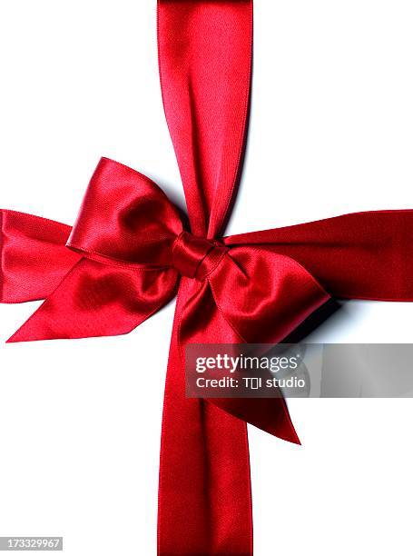 red ribbon bow - gift ribbon imagens e fotografias de stock