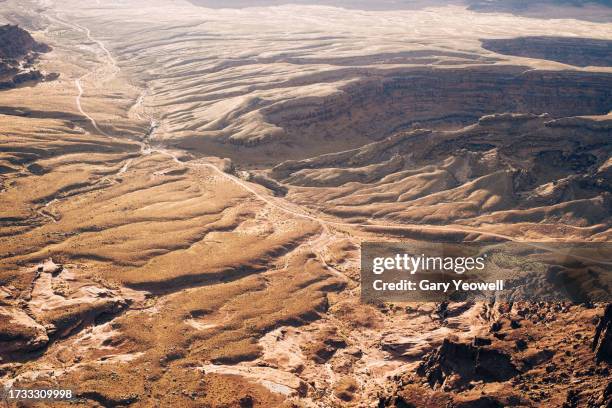 desert road winding through the landscape - utah state parks stock pictures, royalty-free photos & images